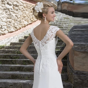 Elegant off-shoulder lace mermaid wedding dress with sheer V-back and buttons