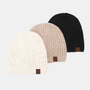 Three-piece set of striped knit beanies in cream, khaki, and black with snowflake leather patch