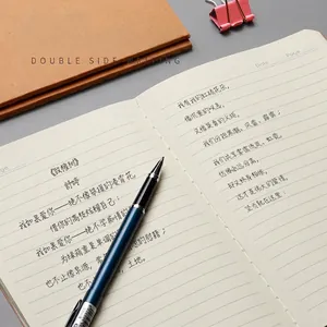 B5 Kraft Paper Notebook with 180-degree lay-flat design and blue pen for smooth writing