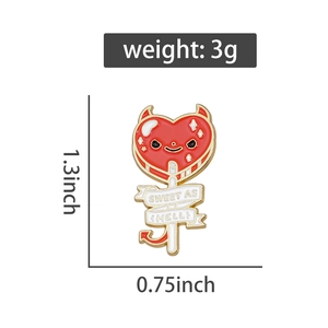 Detail view of heart devil enamel pin with Sweet As Hell text and dimensions