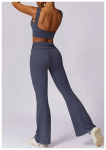 Rear view of haze blue yoga set with racerback sports bra and high-waist flared pants