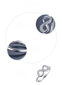 Dettaglio anello infinito in argento 925 con zirconi 5A incastonati a mano con cura