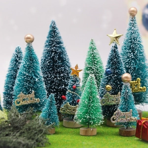 Miniature snowy sisal Christmas trees with wooden bases and colorful festive ornaments