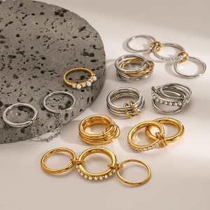Stackable titanium steel pearl rings set with gold and silver metallic finishes