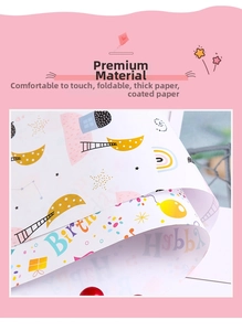 Detail of 80g coated paper birthday gift wrap with colorful letters and moon patterns