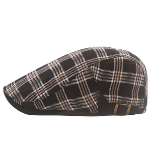 Detail view of colorful plaid beret with adjustable bronze buckle and twill fabric texture