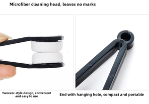 Detail of microfiber eyeglass cleaner tool showing dual-side cleaning head and hanging hole