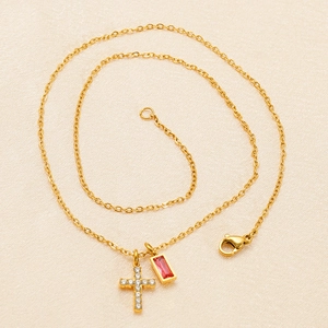 Elegant gold cross necklace with ruby pendant and sparkling zircon accents for women
