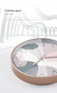 Detail of 12-inch wall clock with rose gold frame and high-transparency glass cover