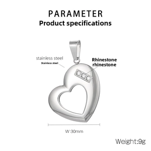 Detail view of heart cutout stainless steel pendant with dimensions 30mm and rhinestones