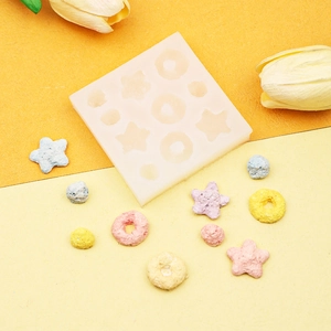 Detail of square silicone mold for DIY star and donut shaped clay crafts and soaps