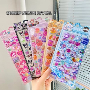 Detailed view of 3D resin cartoon character stickers held in hand for stationery decor