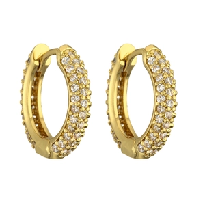 Detailed macro view of luxury gold-plated huggie earrings with triple row CZ pavé stones