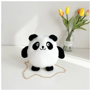 Detail of plush panda crossbody bag with soft white fur and golden metal chain strap