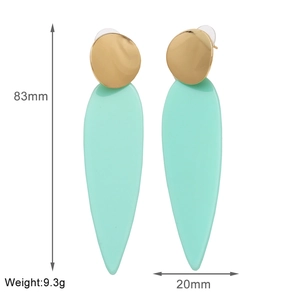 Detail view of mint green teardrop earrings showing 83mm length and 9.3g weight parameters