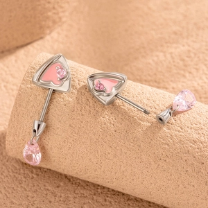 Silver heart earrings with pink teardrop crystals and screw backs in a top view