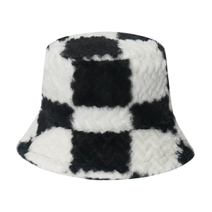 Classic black and white checkered plush bucket hat with warm faux fur texture for winter