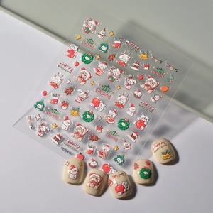 5D embossed Christmas nail art stickers featuring cartoon cats and Santa patterns