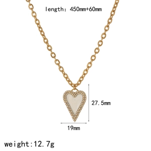 Detailed view of heart pendant dimensions with gold plating and white inlay features