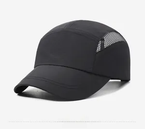 Detail of black quick-dry baseball cap featuring breathable side mesh and short brim
