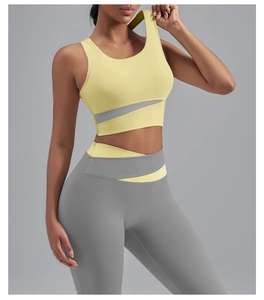 Détail du legging taille croisée et brassière de sport jaune et gris de haute qualité