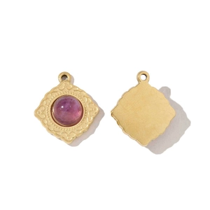 Front and back view of gold rhombic pendant with purple stone and heart carvings
