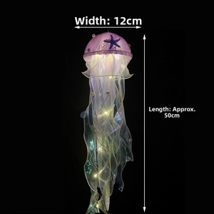 Detail view of glowing iridescent jellyfish lamp with LED string lights and dimensions