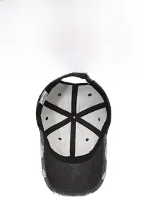 Inside view of washed cotton baseball cap with distressed brim and metal buckle