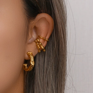 Detailed close-up of 18K gold-plated textured ear cuffs and huggie hoop earring set