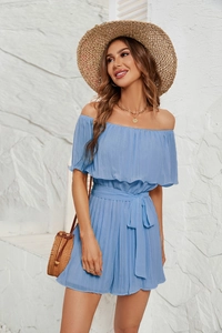 Detail of light blue off-shoulder pleated jumpsuit with matching belt for summer vacation