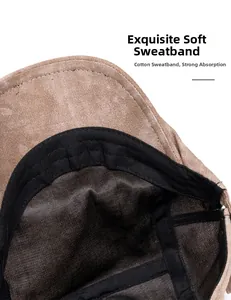Detail of the soft cotton sweatband inside the brown canvas flat cap with stitching