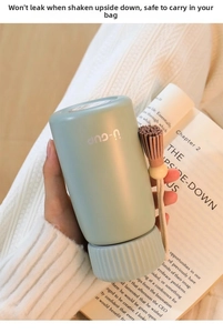 Leak-proof mini portable insulated water bottle in mint green with cute tassel handle