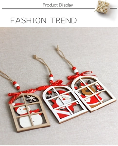 Detailed view of wooden Christmas ornaments featuring Santa, snowman and reindeer designs