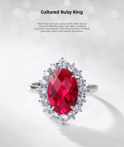 Macro detail of oval cut lab-grown ruby ring with brilliant halo setting in silver