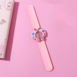 Detailed view of pink butterfly cartoon quartz watch with silicone snap-on strap