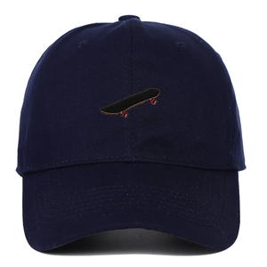 Macro shot of navy blue cotton twill baseball cap with detailed skateboard embroidery