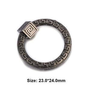 Macro view of Greca pattern buckle in antique silver finish with size 23.0x24.0mm