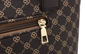 Detailed macro shot of dark brown PU leather with golden zipper and luxury floral print