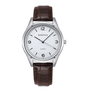 Detailed view of quartz watch with silver case, white dial and brown leather strap