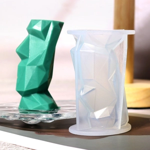 Low-poly Moai siliconen mal en groene geometrische kaars voor doe-het-zelf knutselen op Paaseiland