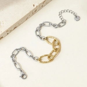 Two-tone stainless steel interlocking heart chain bracelet with silver and gold links
