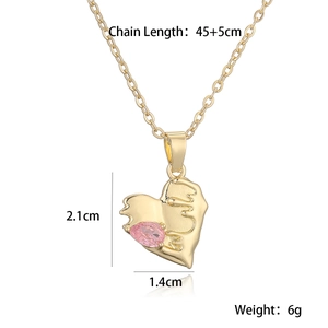 Detail showing gold heart pendant with pink gemstone and chain length dimensions