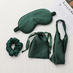 Deep green 4-piece silk sleep set with eye mask, scrunchie, headband and storage bag