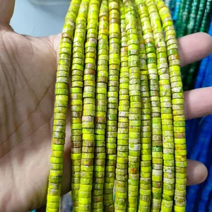 Close-up of yellow and green imperial stone spacer beads for DIY jewelry making
