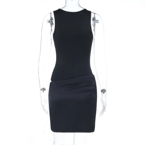 Detail of ruched satin texture and sleeveless bodycon fit on a black mini dress
