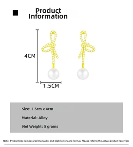 Detail view of bowknot pearl earrings with dimensions and gold alloy material specs