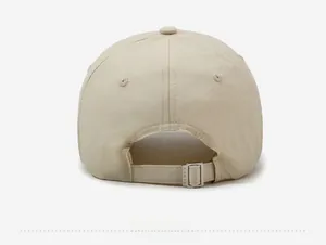 Detail view of the adjustable metal buckle and stitching on the quick-dry baseball cap