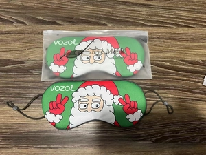 Detail of Santa Claus print ice silk sleep mask with frosted storage zipper bag