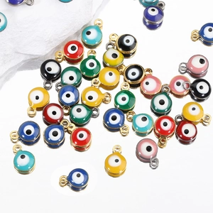 Golden stainless steel Turkish evil eye charms in multiple colors for DIY jewelry making