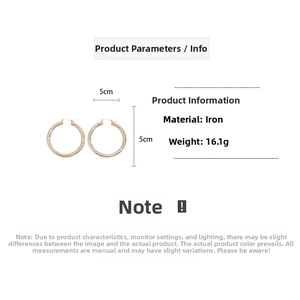 Detail view of large rose gold twisted hoop earrings with 5cm diameter specifications